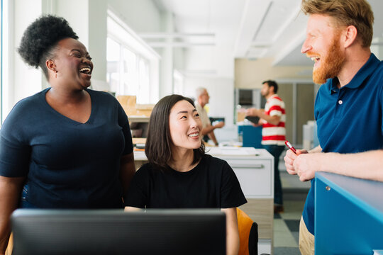 Colleagues Working Together in Office