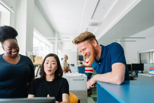 Colleagues Working Together in Office