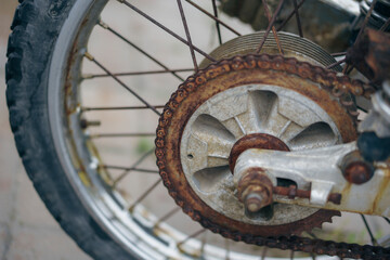 Fototapeta na wymiar Rusty motorcycle transmission chain