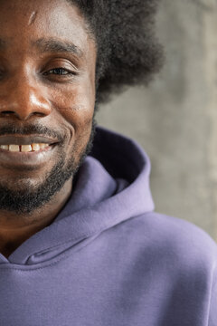 Happy black man in hoodie