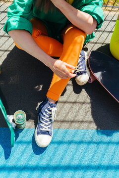 A girl with a skate.
