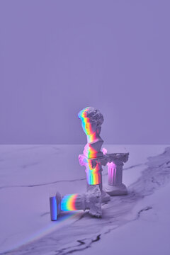 Classic statue and columns with rainbow overlay.