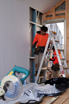 Young apprentice builders at work