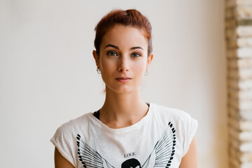 Attractive woman standing in studio