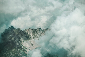 Clouds Kissing The Mountain Peaks - obrazy, fototapety, plakaty