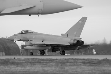 Black and white photo of Typhoon 436 under the nose at RAF Coningsby - stock photo. - obrazy, fototapety, plakaty