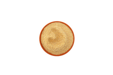 Hulbah powder or Fenugreek flour in ceramic plate isolated on white background, top view. Herbal nutritional supplement. Soothe upset stomach and digestive problems