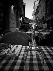 drink on a bar terrace with Italian checkered tablecloth