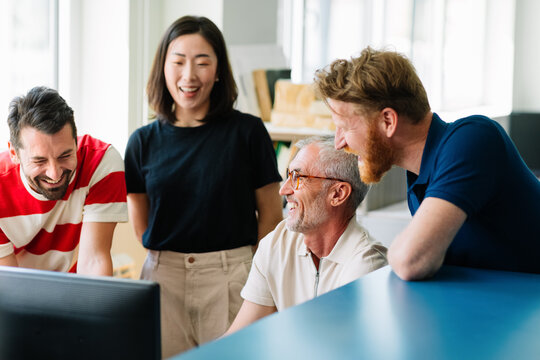 Colleagues Working Together in Office