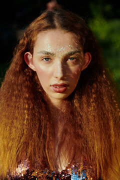 Close Up Portrait Of A Young Woman With Ginger Hair