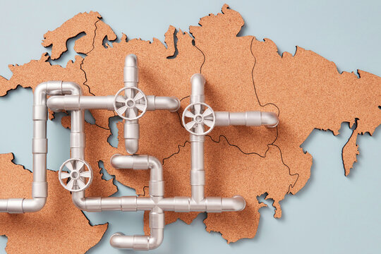 Oil piping over cork Eurasia map.