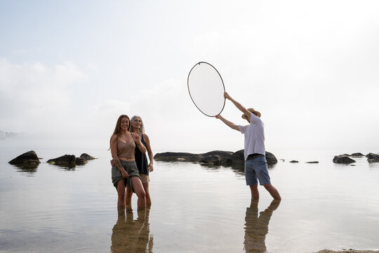 Making of woman daughter portrait at beach