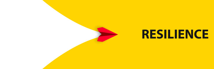 Airplane red airplane towards the word RESILIENCE.
Endurance idea concept.