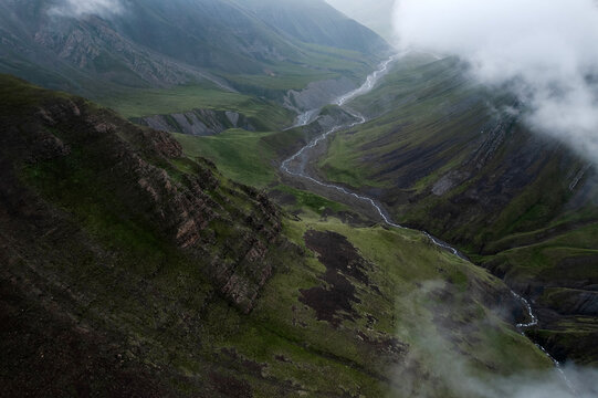 Mountain River Valley In The Mist