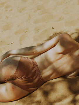 Beautiful sunbathing on the beach 