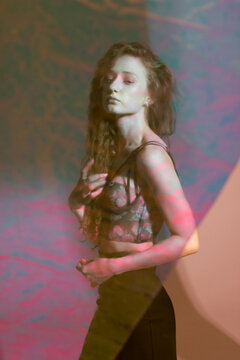 Portrait of a woman in expressive abstract light.