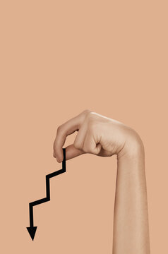 Male Hand Holding Growth Chart