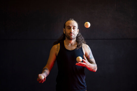 Man juggling with balls