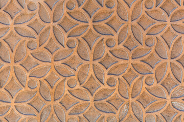 Texture background from a stucco wall covered with traditional patterns in Segovia, Spain