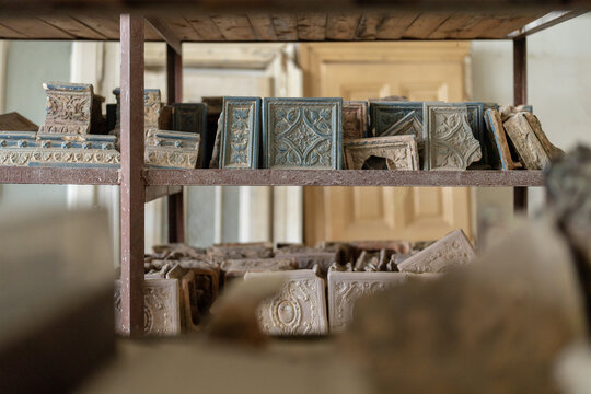 Ceramic tile standing at the shelves and preparing for the renovation
