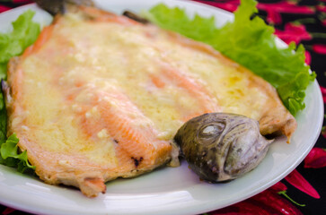 Trout with asparagus cream sauce.