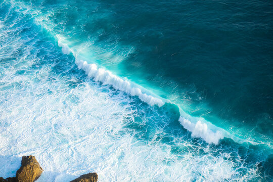 Ocean waves crashing on a sunny day in nature outdoor