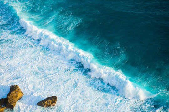 Ocean waves crashing on a sunny day in nature outdoor