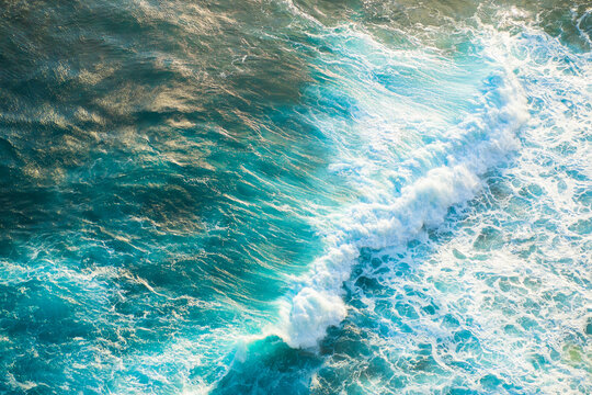 Ocean waves crashing on a sunny day in nature outdoor