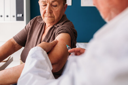Elder Woman Getting Vaccine 