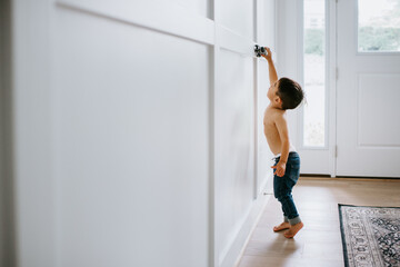 toddler boy playing with toy 