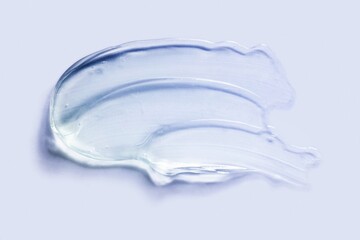 Obraz na płótnie Canvas Liquid gel cosmetic smudge texture blue gray background