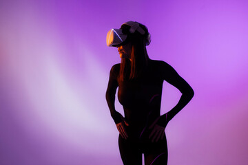 Portrait of sexy woman wearing vr headset 