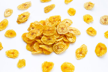 Banana slice chips on white background.
