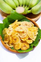 Banana slice chips on white background.