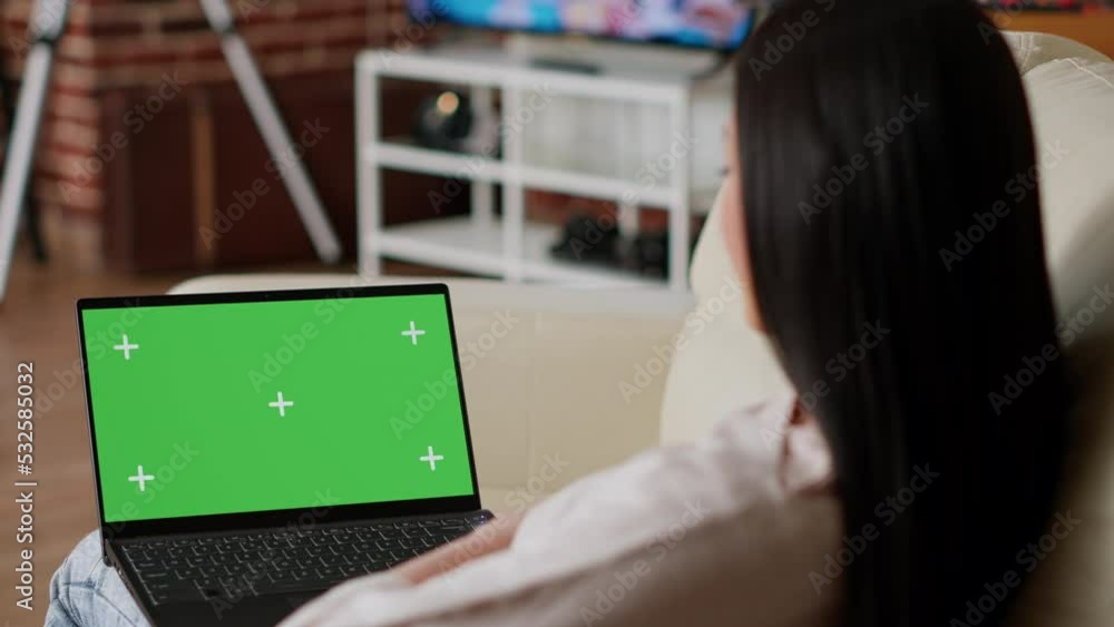 Poster person with computer having mockup isolated background while in apartment. woman having laptop with 