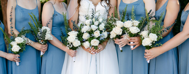 Panorama of Bride and Bridesmaids Holding Bouquets