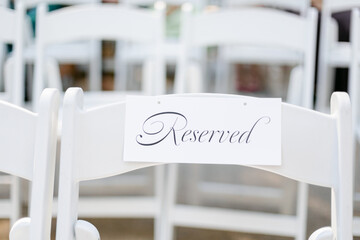 Closeup of Reserved Seating at Wedding Ceremony