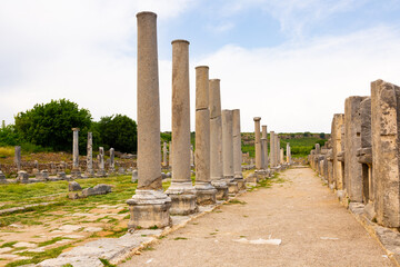 Fototapeta na wymiar Columned streets of Perge, Pamphylian ancient city in Antalya Province, Turkey.