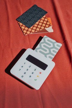 wireless payment terminal and some simulated credit cards