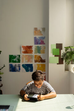 young boy doing homework