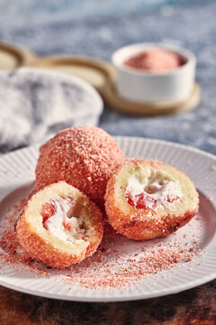 Sweet Dumplings With Strawberry Cream.