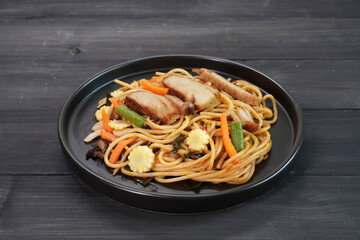 Spaghetti. Thai style spicy vegetarian spaghetti (Pad Khee Mao or Drunken stir fried). Vegetarian food. Vegetarian festival. Italian - Thai fusion food