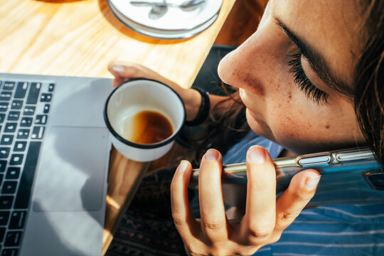 Overhead View Of Woman Working At Her Office