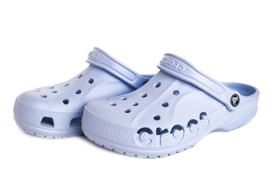 pair of blue Crocs sandals with a distinctive design on a white background.