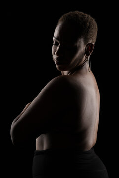 Portrait of an afro woman on black background