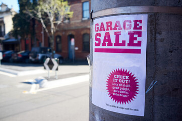 Garage Sale sign in city street