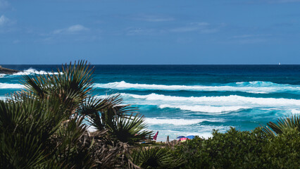 Amazing beach with turquoise water in Cala Mesquida, Mallorca, Spain. Selective focus.
