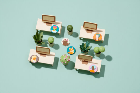 Miniature businesspeople team at the office