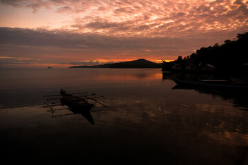 Fototapeta na wymiar Sunrise on Room Island, Cendrawasih Bay area, Teluk Wondama district, West Papua province