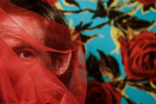 Man with red tulle